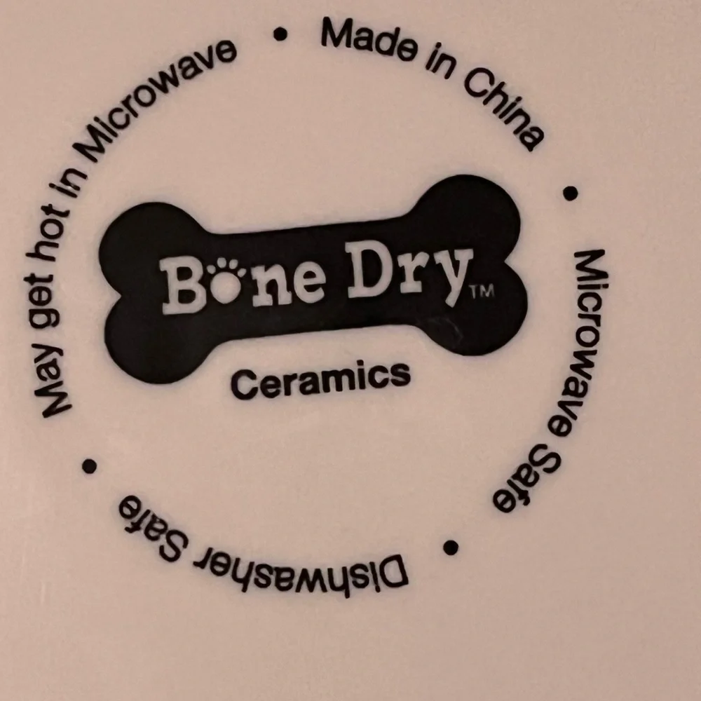 BONE Dry pet food/water bowls navy paw print exterior one gripper 5” dia 1.75”D